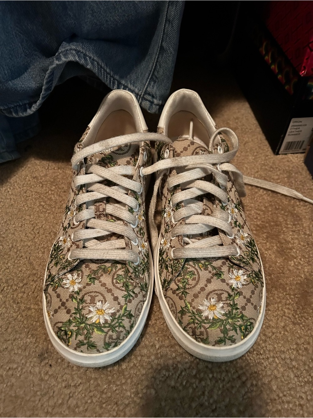 T monogram Tory Burch Howell floral sneaker.